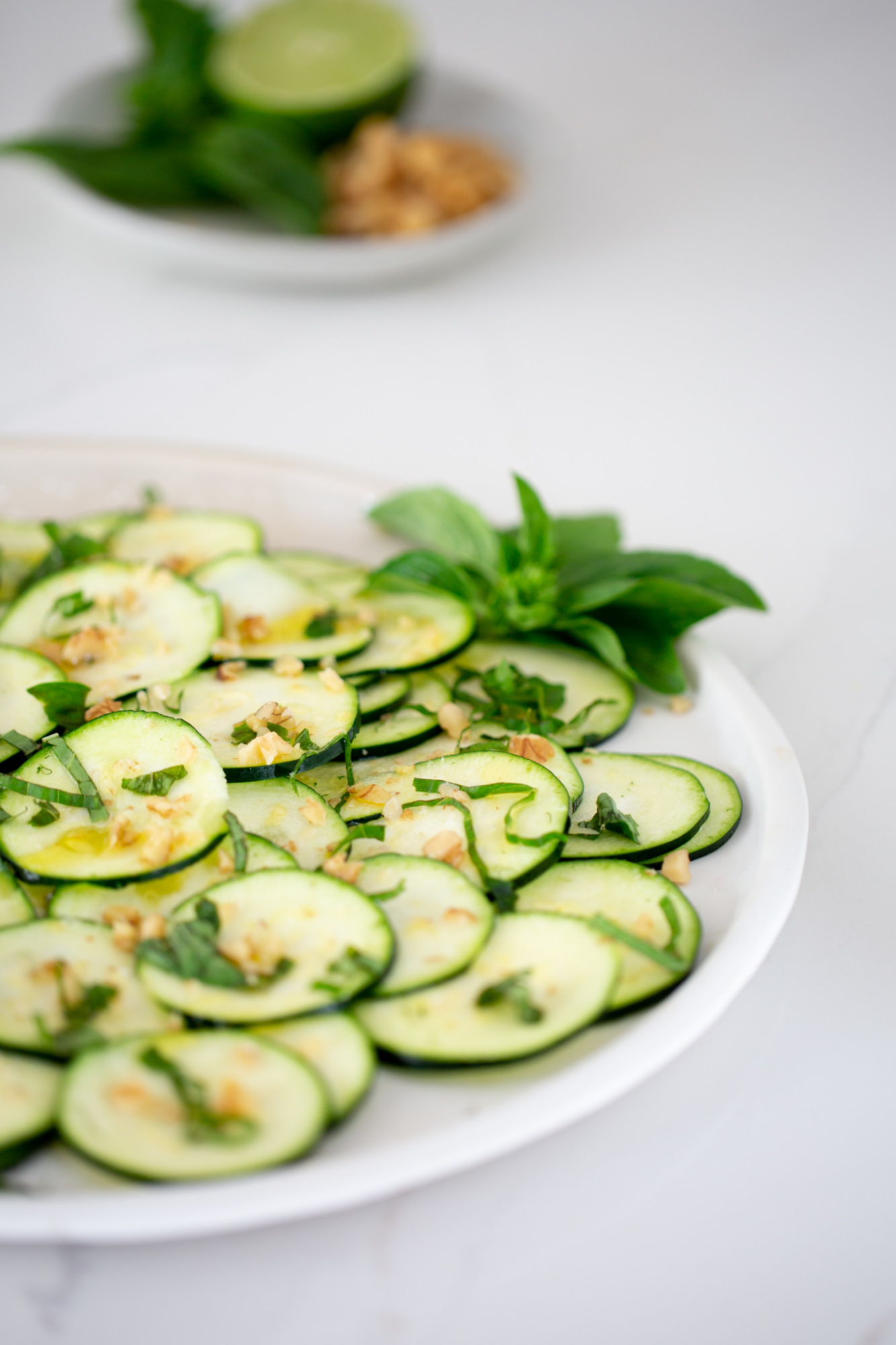 Zucchini carpaccio topped with extra virgin olive oil