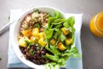 Brown rice, black beans and grilled pineapple bowl with chile ancho dressing