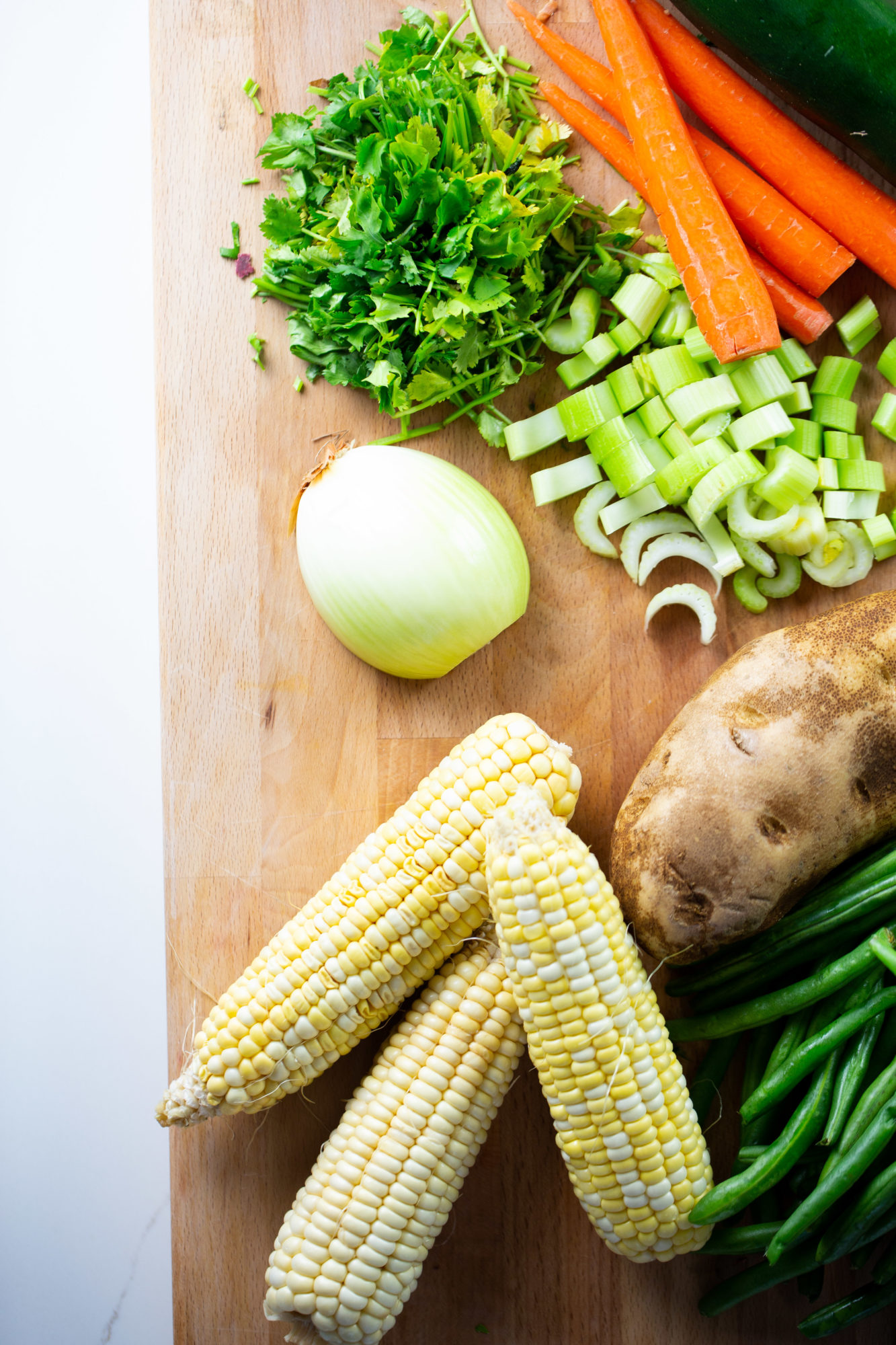chopped vegetables over cutting board