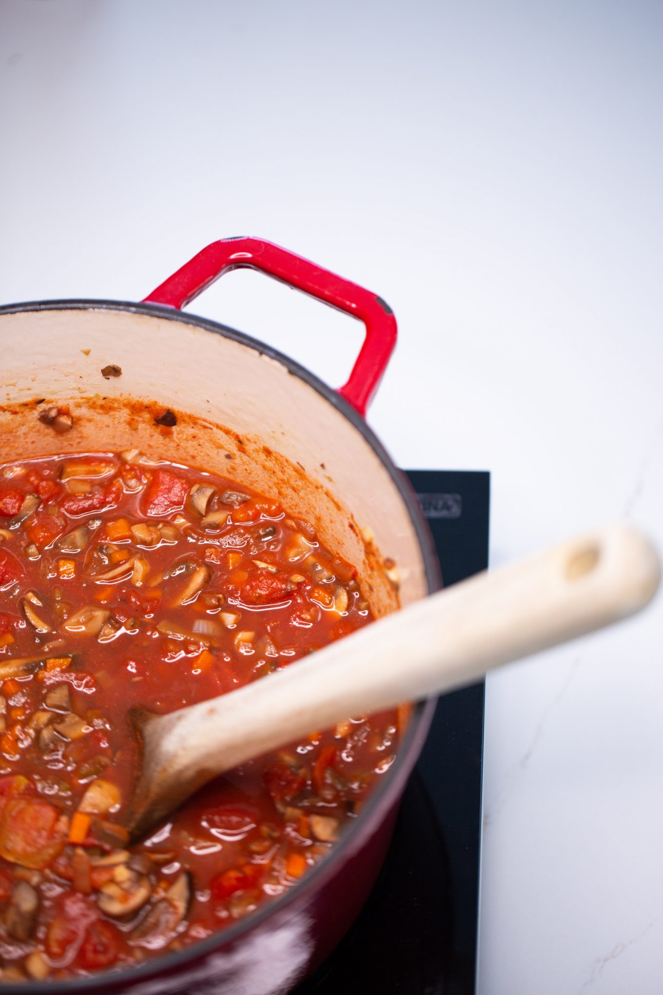 bolognese sauce in a cast iron pot