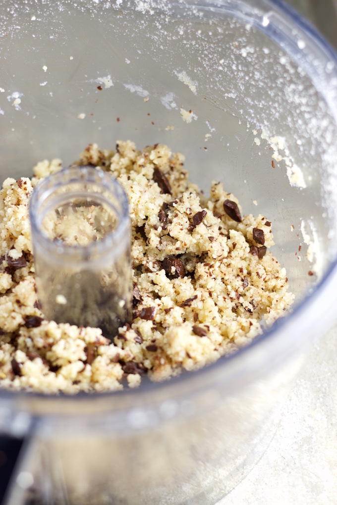 Healthy vegan edible cookie dough in the food processor container