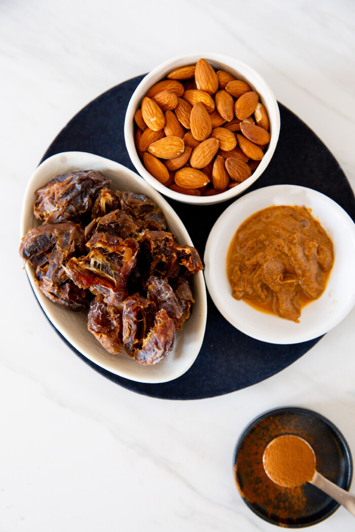 ingredients to make power energy recipes, almonds, dates and almond butter.