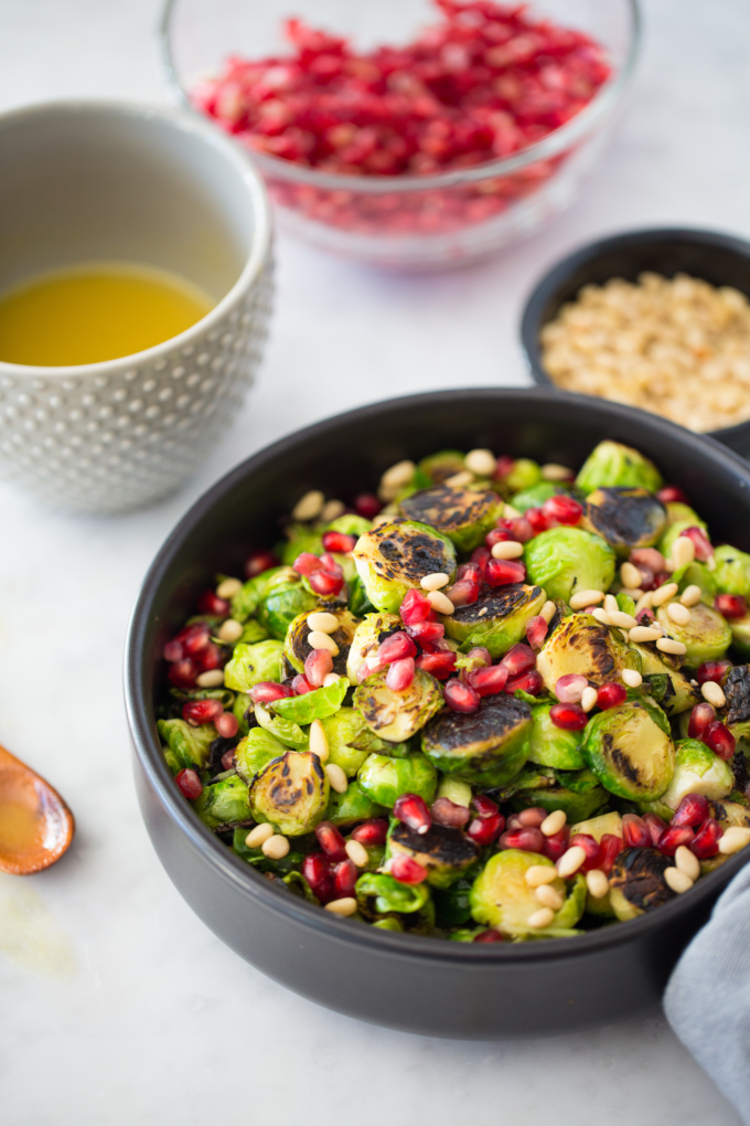 Roasted brussels sprouts salad with pommegrante seeds and maple dijon vinaigrette