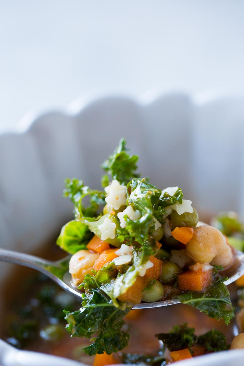 A spoonfull of soups loaded with vegetables