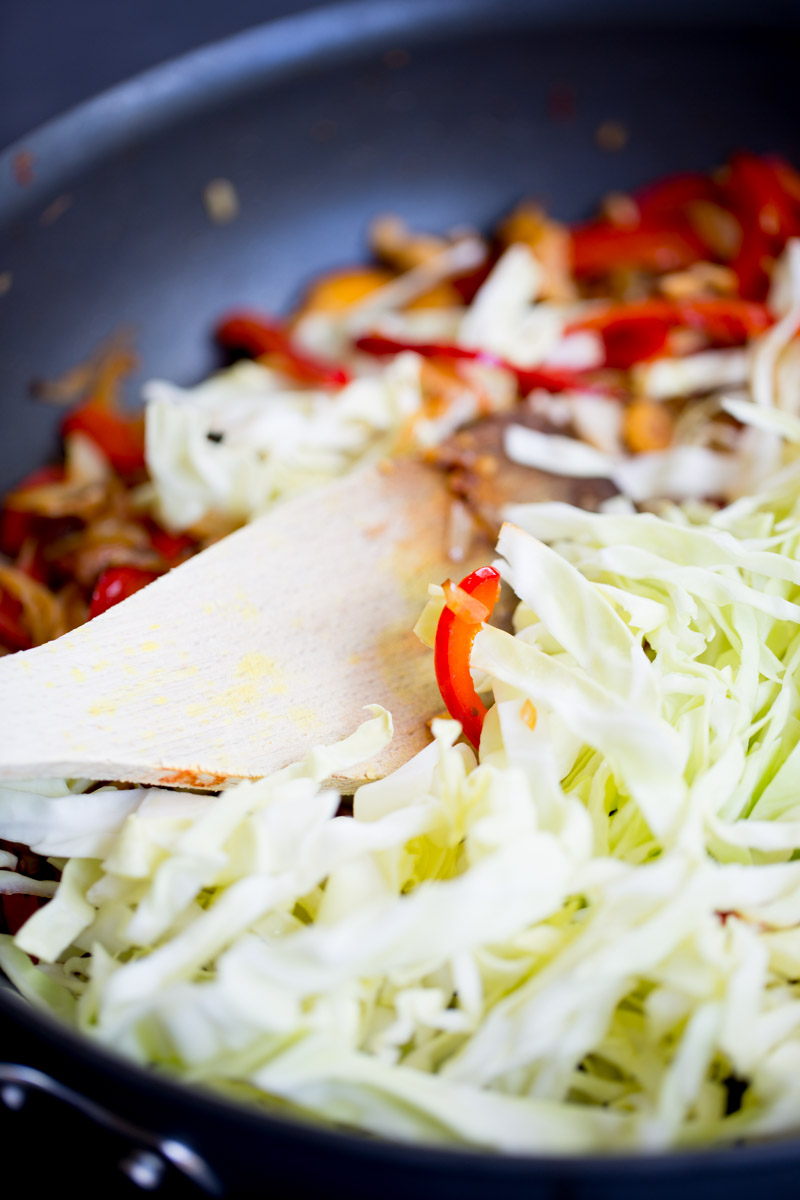 A skillet with vegetables