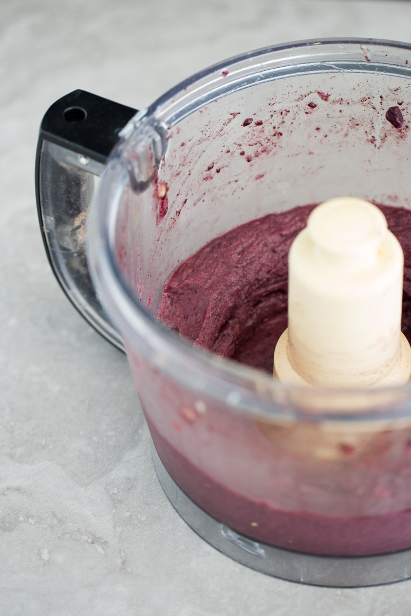 banana and açaí ice-cream in the container of a food processor