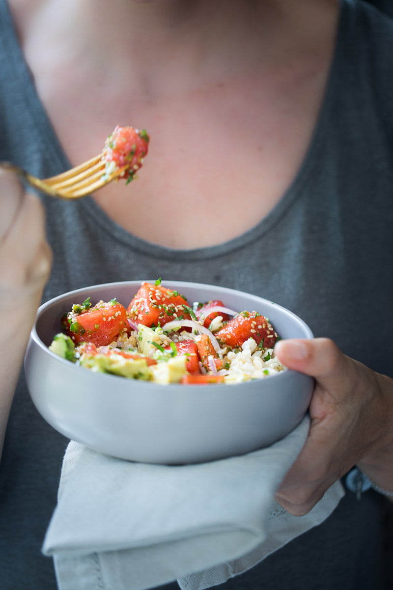 Vegan poke bowl. This poke bowl is made with rice, avocado, and watermelon.