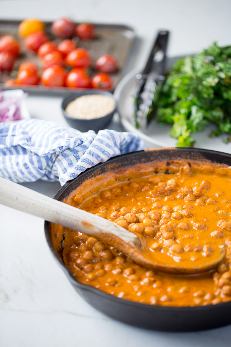 skillet with chickpeas in mole sauce