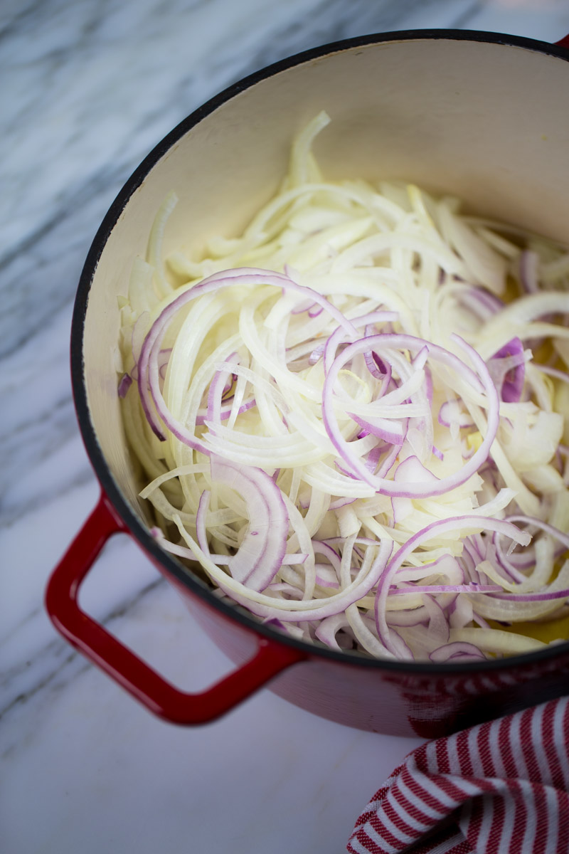 Sliced onions in dutch oven