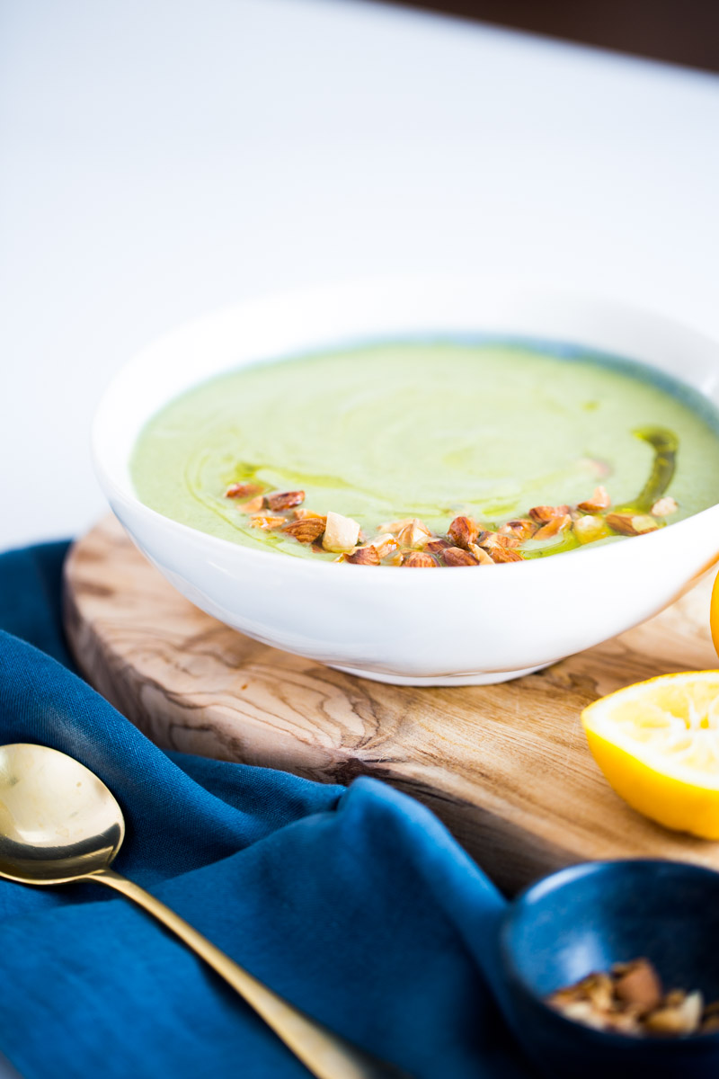 BROCCOLI AND ZUCCHINI SOUP with chopped almonds and a drizzle of olive oil