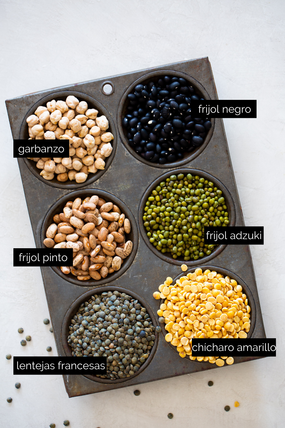 different legumes in a muffin tin