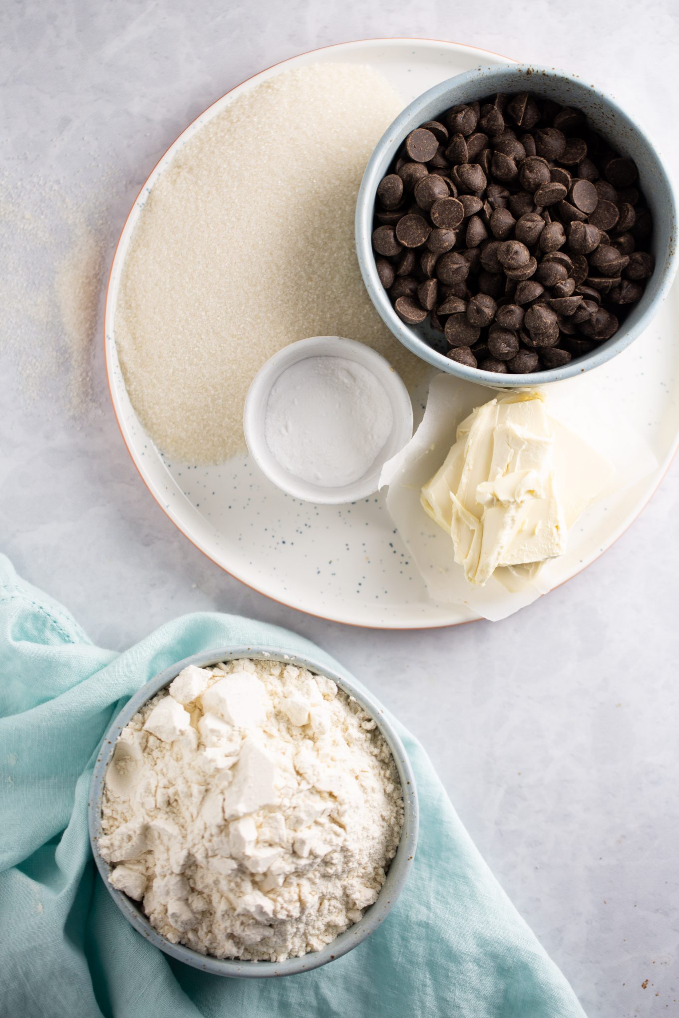 Ingredients to make a vegan chocolate chip cookie