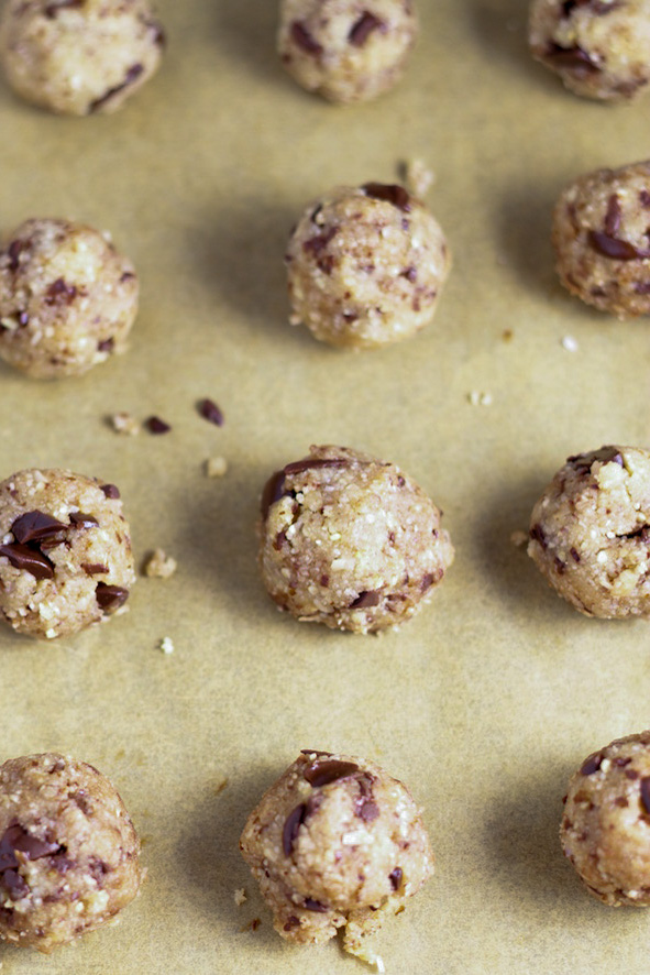 vegan chocolate chip cookie dough bites over parchemnt paper
