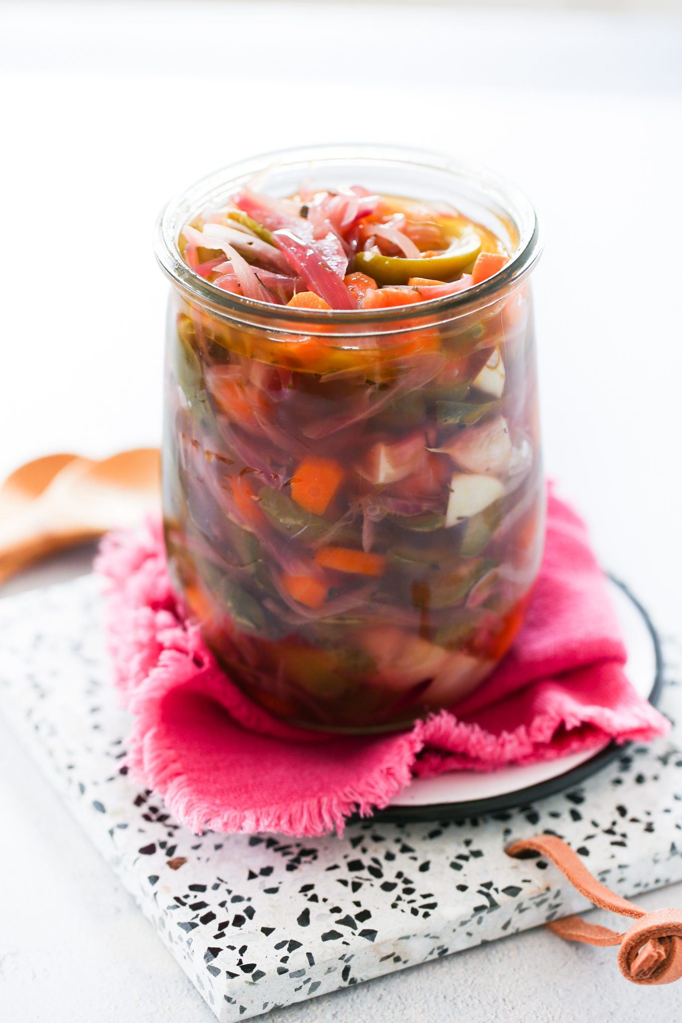 mexican pickled jalapenos in a glass jar