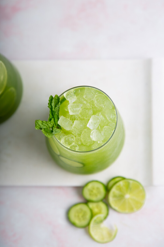 Cucumber limeade served with nugget ice and mint leaves