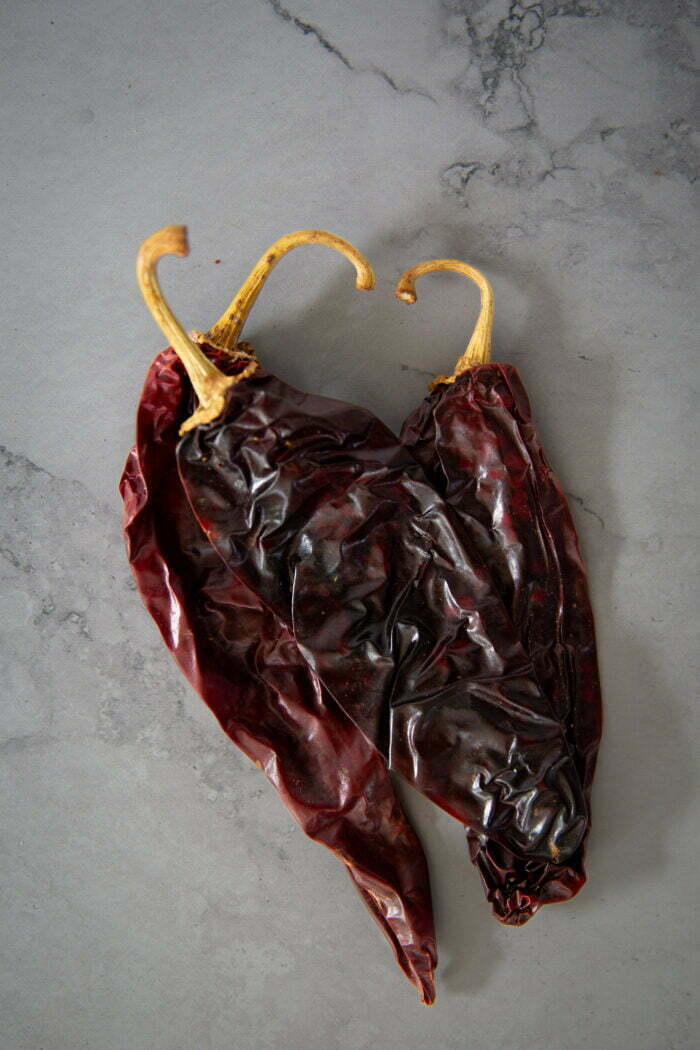 guajillo peppers on a concret kitchen top