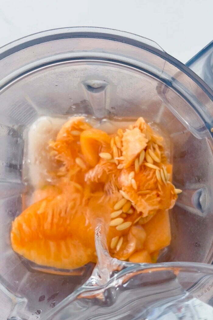 Adding water to the blender with the resto of the ingredients