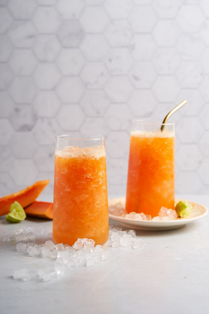 two glasess with papaya agua fresca.